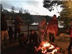 Campfire at MEREDITH WOODS 4 SEASON CAMPING AREA - thumbnail