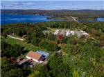 Aerial view of swimming pool and sites at ADVENTURES EAST CAMPGROUND & COTTAGES - thumbnail