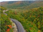 An aerial view of the winding road nearby at ADVENTURES EAST CAMPGROUND & COTTAGES - thumbnail