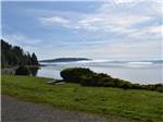 A view of the lake with mist over the water at THE WATERFRONT AT POTLATCH RESORT & RV PARK - thumbnail