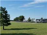 A large green grassy area at FISHBERRY CAMPGROUND - thumbnail