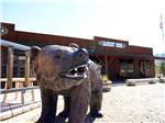 A large bear statue in front of the banquet room at YELLOWSTONE VALLEY INN & RV PARK - thumbnail