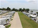 RVs and trailers in sites at SAN JACINTO RIVERFRONT RV PARK - thumbnail