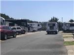 A shuttle bus picking people up at LOGAN ROAD RV PARK - thumbnail