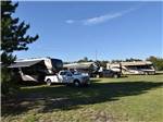 RVs parked on the grassy sites at DAVY LAKE CAMPGROUND - thumbnail