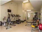 Exercise room with equipment at WILLISTON CROSSINGS RV RESORT - thumbnail