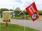 The front entrance sign with a Good Sam flag at FROG CITY RV PARK - thumbnail
