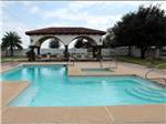 The swimming pool area at LAZY PALMS RANCH RV PARK - thumbnail