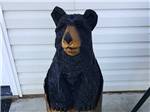A statue of a black bear at DAN RIVER CAMPGROUND - thumbnail
