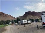 A row of gravel back in sites at CHALLIS GOLF COURSE RV PARK - thumbnail