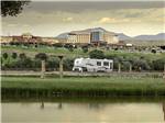Large trailer in a waterfront site at ISLETA LAKES & RV PARK - thumbnail