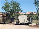RVs in sites with view of the resort at ISLETA LAKES & RV PARK - thumbnail