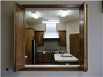 A window to the kitchen at BAKERSFIELD RIVER RUN RV PARK - thumbnail