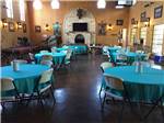 Tables set up in the recreation hall at OAK CREEK RV PARK - thumbnail