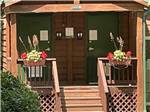 The front of the bathroom building at SOLITUDE POINTE CABINS & RV PARK - thumbnail