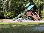 The playground equipment at SOLITUDE POINTE CABINS & RV PARK - thumbnail
