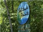 The front entrance sign at SOLITUDE POINTE CABINS & RV PARK - thumbnail
