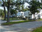 A line up of 5th-wheel trailers at BENNETT'S RV RANCH - thumbnail