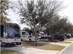A line of paved RV sites at GERONIMO RV PARK - thumbnail