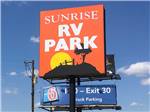 Business sign near main entrance at SUNRISE RV PARK - thumbnail