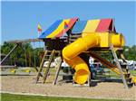 Playground with swing set at DEER CREEK VALLEY RV PARK - thumbnail