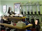 Hats and clubs on display at RIVERSIDE GOLF & RV PARK - thumbnail