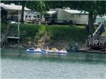 Paddle boats on the water at LAKEVIEW RV PARK - thumbnail