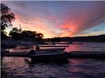 Boats on the water at dusk at COULEE PLAYLAND - thumbnail