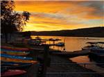 Kayaks and boats on Banks Lake during sunset at COULEE PLAYLAND - thumbnail