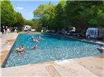 People swimming in the pool at CIRCLE CG FARM CAMPGROUND - thumbnail