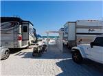 A couple of motorhomes on the sand at CAMPING ON THE GULF - thumbnail