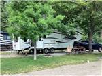 Fifth-wheel near picnic table at site at CAMPGROUND ST REGIS - thumbnail