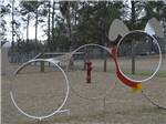 Circular hoops in the pet area at TRAVELERS CAMPGROUND - thumbnail