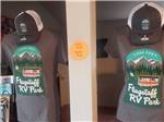 Some of the logo merchandise available at FLAGSTAFF RV PARK - thumbnail