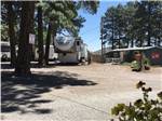 A fifth wheel trailer by the front office at FLAGSTAFF RV PARK - thumbnail