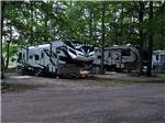 A row of travel trailers in gravel sites at HTR DOOR COUNTY - thumbnail