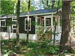 A cottage surrounded by trees at HTR DOOR COUNTY - thumbnail