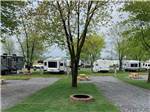 Spacious RV sites with built-in fire pits at HERSHEY ROAD CAMPGROUND - thumbnail