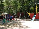 Some of the playground equipment at HIDDEN ACRES FAMILY CAMPGROUND - thumbnail