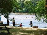 People playing on the river at HIDDEN ACRES FAMILY CAMPGROUND - thumbnail