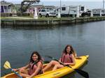 A couple of girls in a kayak at HATTERAS SANDS CAMPGROUND - thumbnail