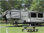A fifth-wheel trailer with a picnic table at ALLATOONA LANDING MARINE RESORT - thumbnail