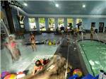 People playing in the indoor pools at STONY POINT RESORT RV PARK & CAMPGROUND - thumbnail