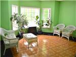 A green room with a sitting area at ATLANTA SOUTH RV RESORT - thumbnail