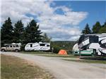 A row of gravel RV sites at PONDEROSA PINES CAMPGROUND - thumbnail