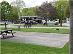 A row of paved RV sites at WOODLAND PARK - thumbnail