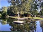 A dock in the middle of the river at ROCKY MOUNTAIN 'HI' RV PARK AND CAMPGROUND - thumbnail