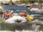 A group of people white water rafting nearby at LAKE ISABELLA RV RESORT - thumbnail