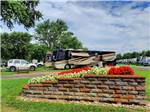 Flowers near RV sites at ELKHART CAMPGROUND - thumbnail