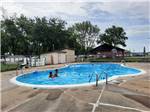 Kids playing at on-site pool at ELKHART CAMPGROUND - thumbnail